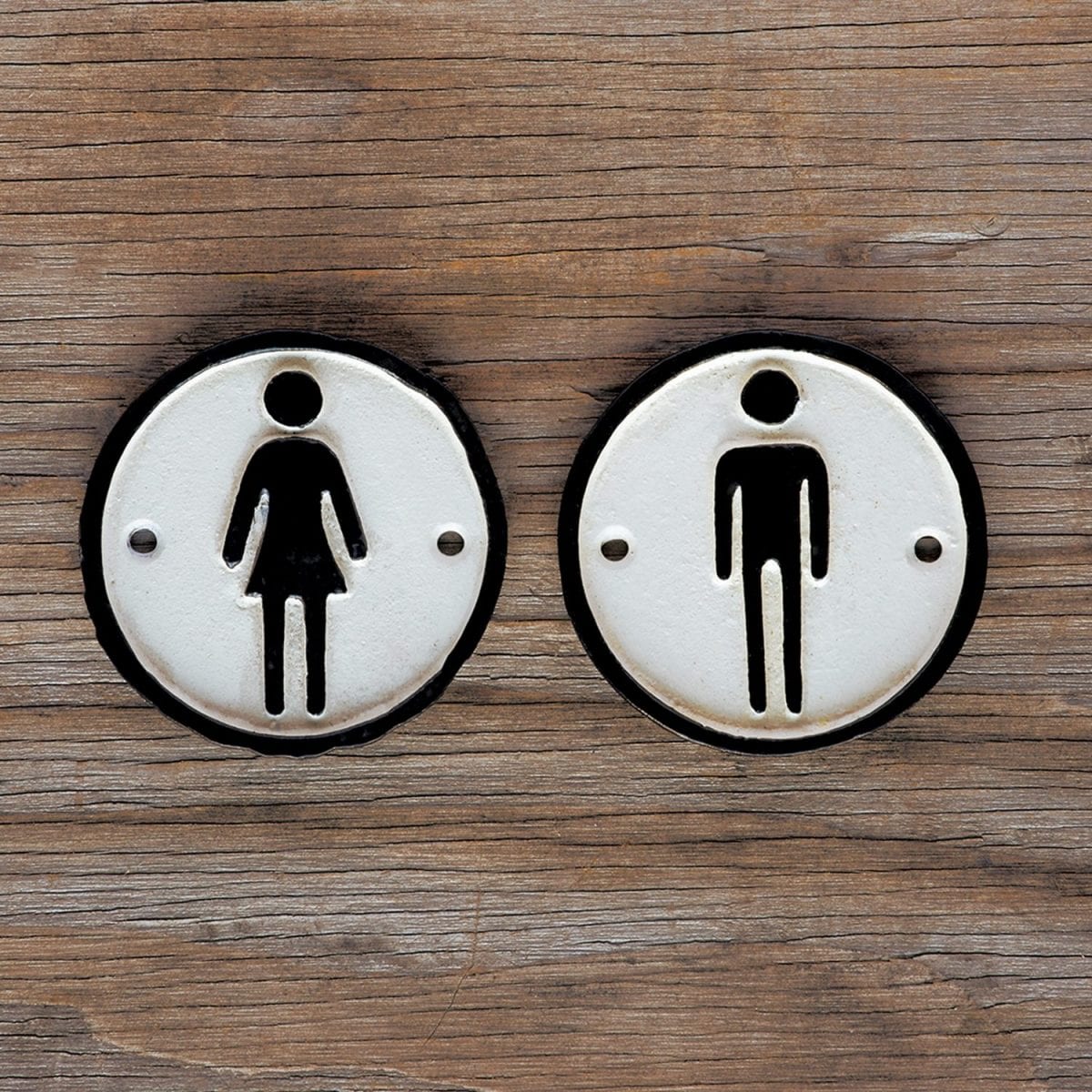 man_and_woman_cast_iron_signs